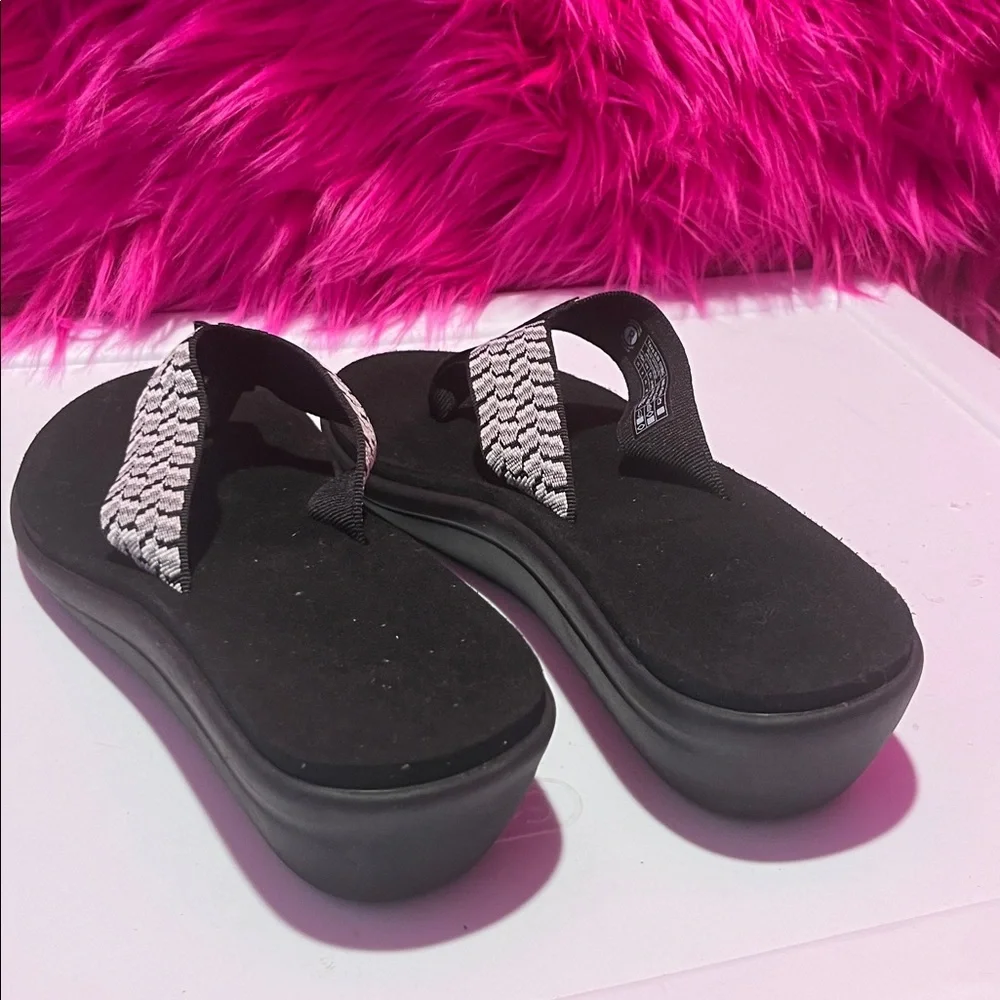 Teva Black Flip Flops with White Patterned Straps